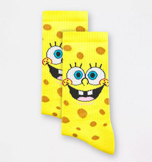 Qorapa LaraLara yellow SpongeBob SquarePants crew socks with character face and brown porous pattern