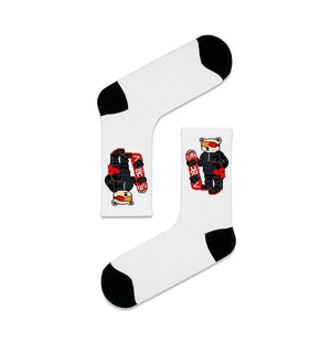 Qorapa LaraLara white crew socks featuring a graphic of a snowboarder bear with black toe and heel accents