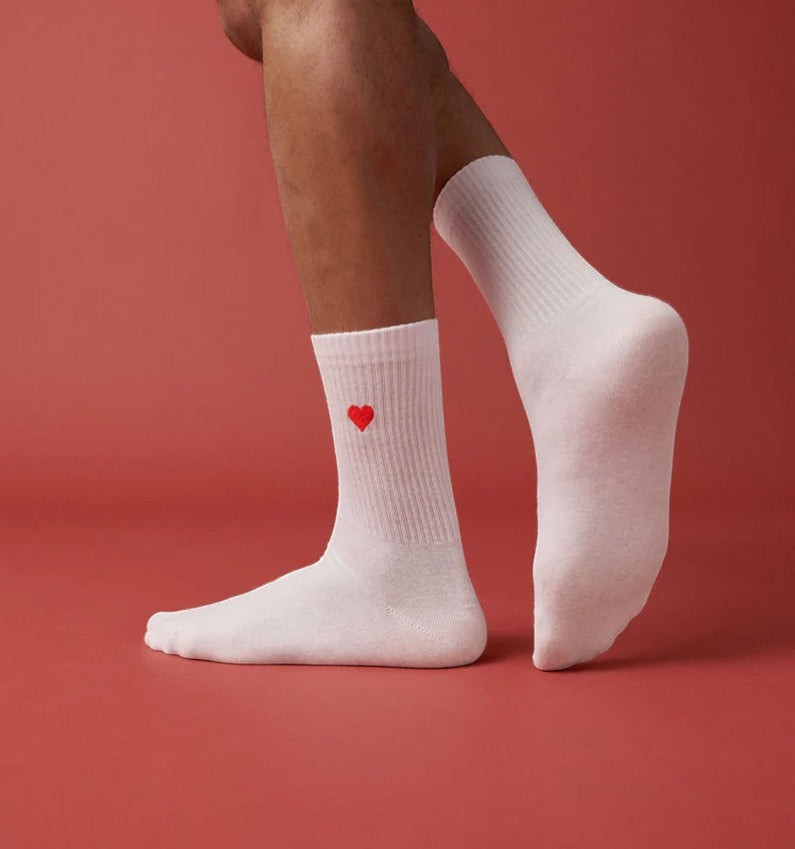 Qorapa LaraLara white cotton crew socks with a small embroidered red heart detail on a ribbed cuff