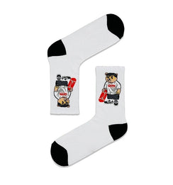 Qorapa LaraLara white crew socks featuring a graphic of a bear holding a skateboard with black toe and heel accents.