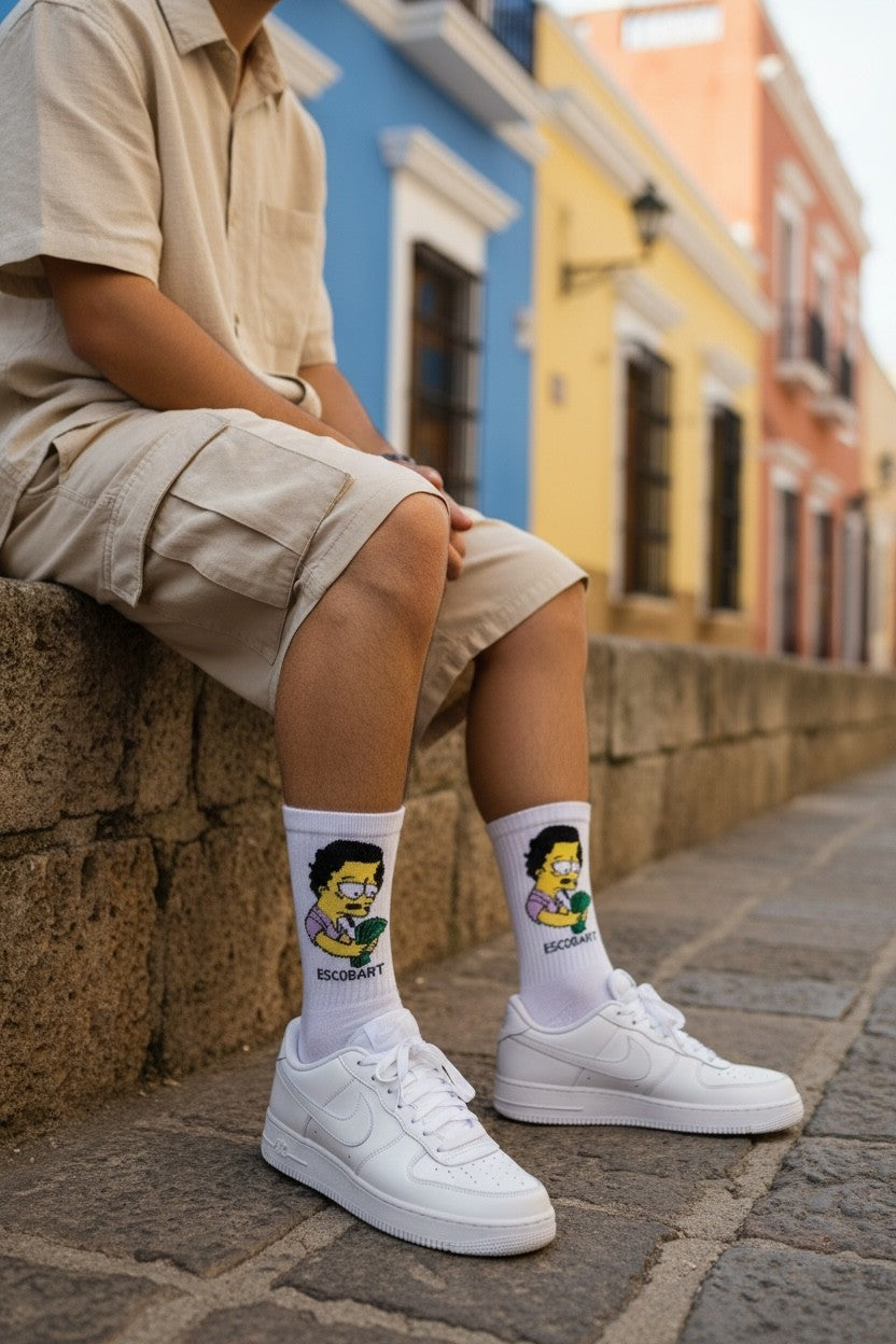Qorapa LaraLara white cotton crew socks featuring a vibrant cartoon character graphic worn with white sneakers