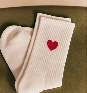 Qorapa LaraLara white cotton crew socks with a small embroidered red heart detail on the ribbed cuff